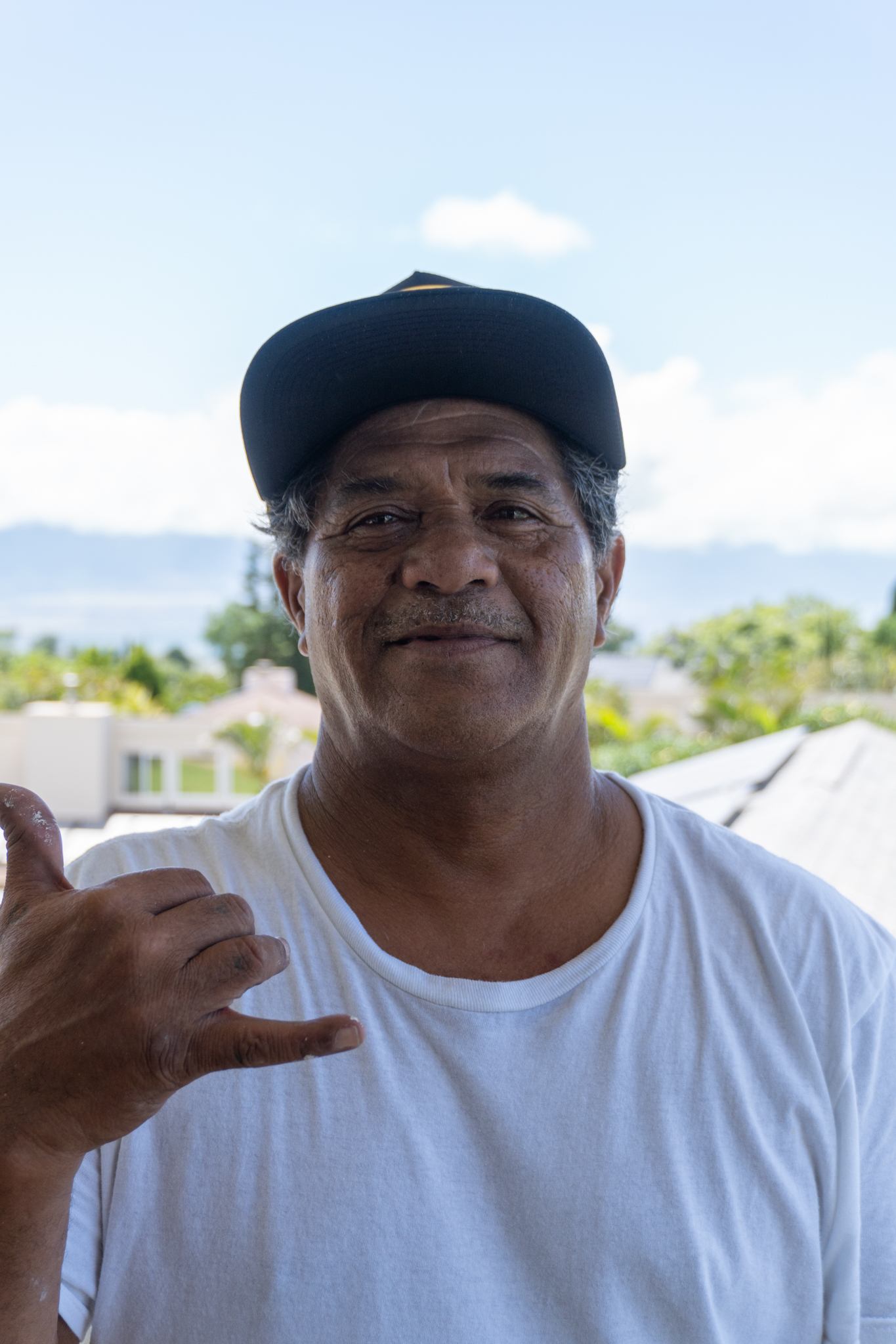 97 Painting Maui crew member